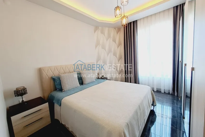 Приобрести Квартира 1+1 с мебелью и частичным видом на море, район Махмутлар – Алания 8 