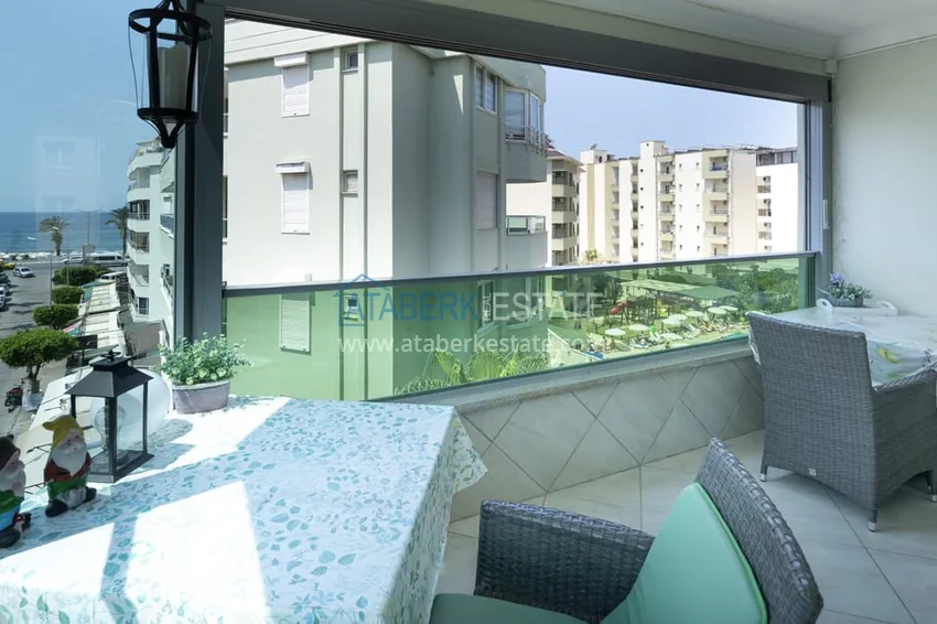 Приобрести Меблированная квартира с видом на море и застекленным балконом – первая береговая, район Оба 6 