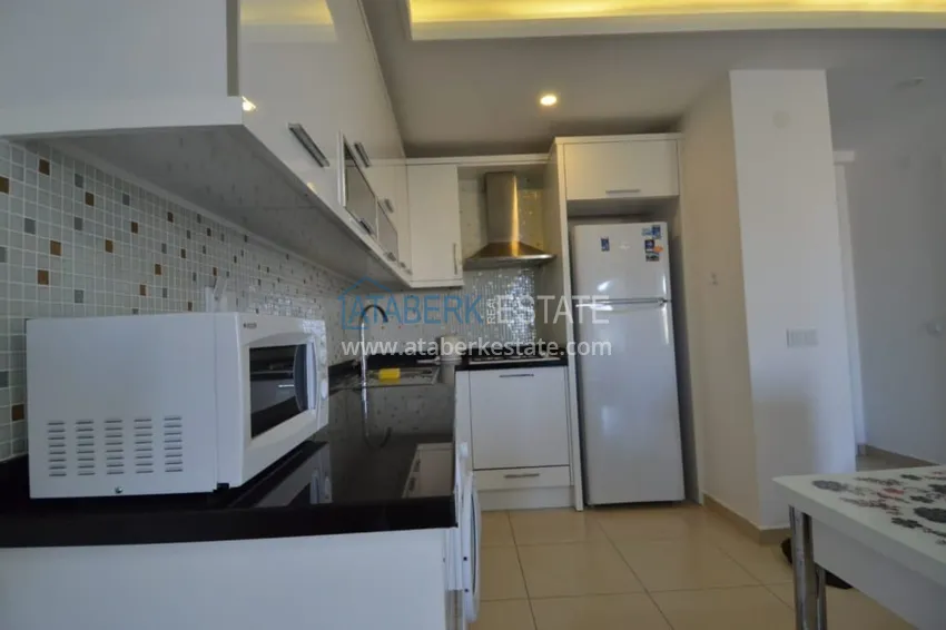 Приобрести Двухкомнатная квартира под ключ в комплексе с концепцией отеля – Алания, район Авсаллар 5 