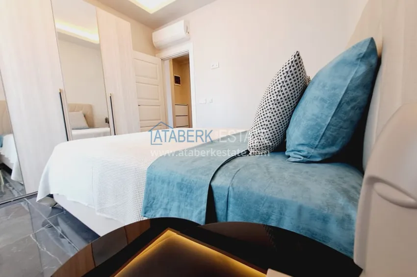 Приобрести Квартира 1+1 с мебелью и частичным видом на море, район Махмутлар – Алания 10 