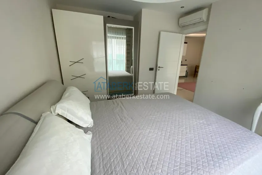 Приобрести Меблированная квартира 1+1 с видом на море в элитном комплексе, район Каргыджак – Алания 7