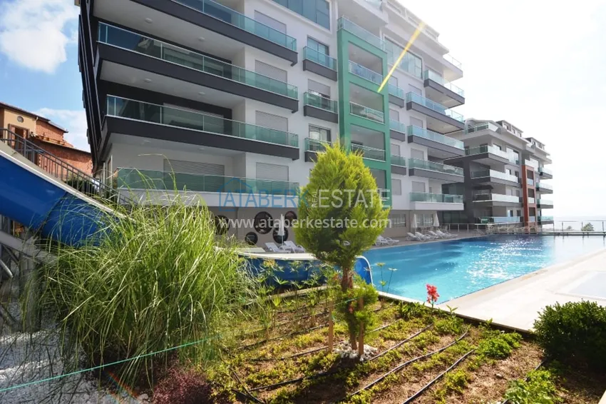 Меблированная квартира 1+1 с видом на море в элитном комплексе, район Каргыджак – Алания 14