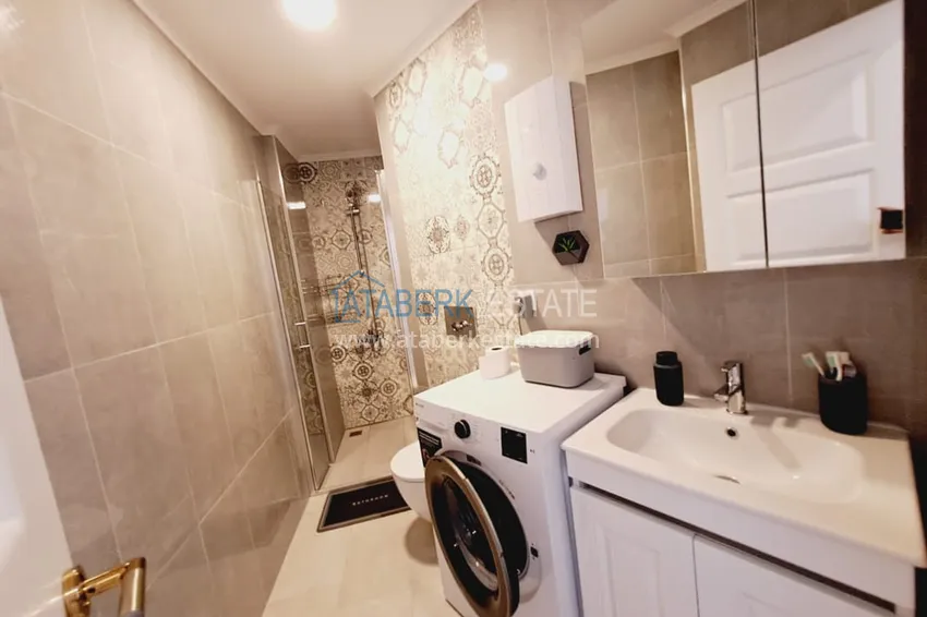 Приобрести Квартира 1+1 с мебелью и частичным видом на море, район Махмутлар – Алания 11 