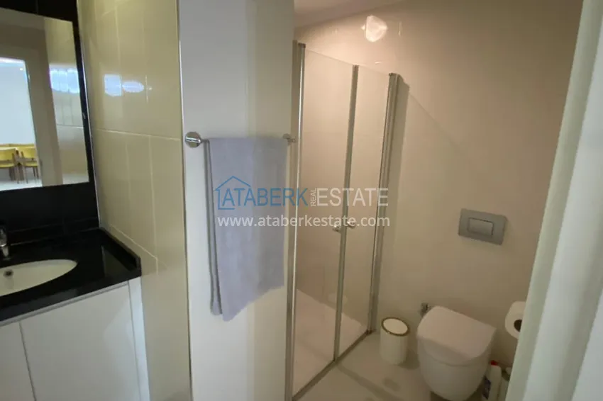 Приобрести Меблированная квартира 1+1 с видом на море в элитном комплексе, район Каргыджак – Алания 8