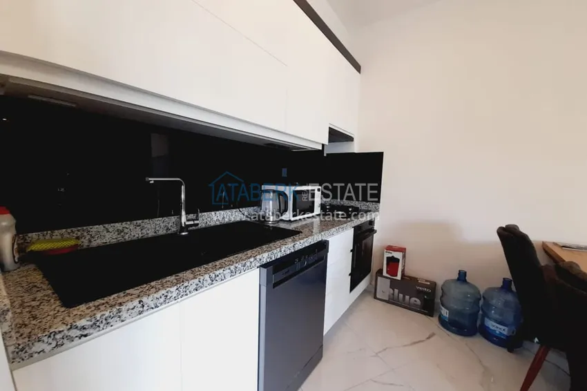 Приобрести Квартира 1+1 с мебелью и видом на море в комплексе на первой береговой – Алания, район Каргыджак 7 