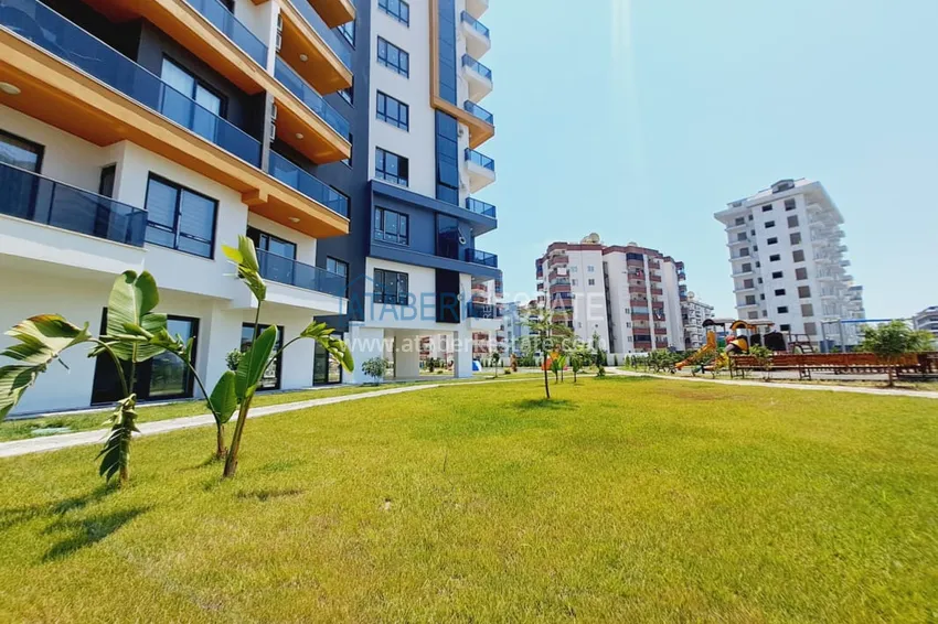 Квартира 1+1 с мебелью и частичным видом на море, район Махмутлар – Алания 11 