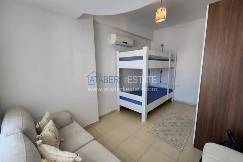 Приобрести Трёхкомнатные апартаменты с мебелью и видом на море, район Махмутлар – Алания 11