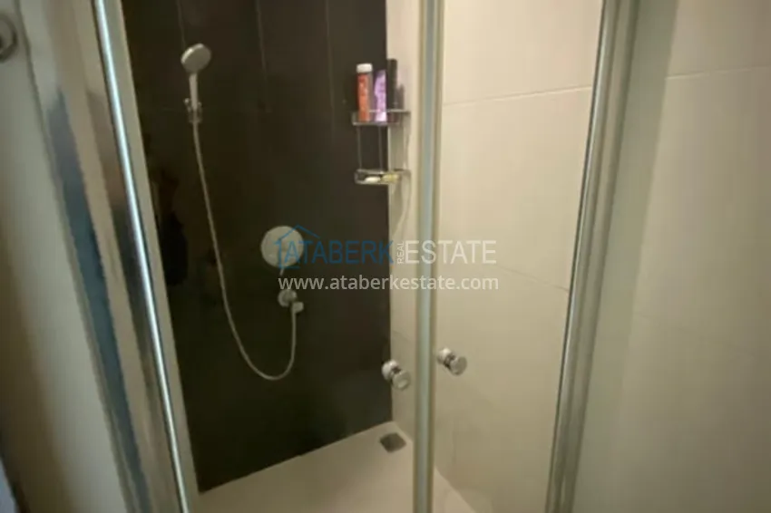 Приобрести Меблированная квартира 1+1 с видом на море в элитном комплексе, район Каргыджак – Алания 9