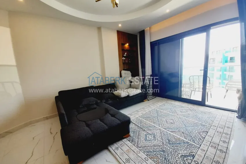 Приобрести Квартира 1+1 с мебелью и видом на море в комплексе на первой береговой – Алания, район Каргыджак 8 