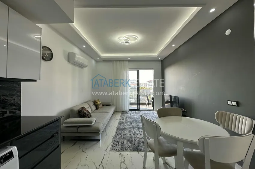 Приобрести Двухкомнатные меблированные квартиры с видом на море, район Кестель, Алания 14