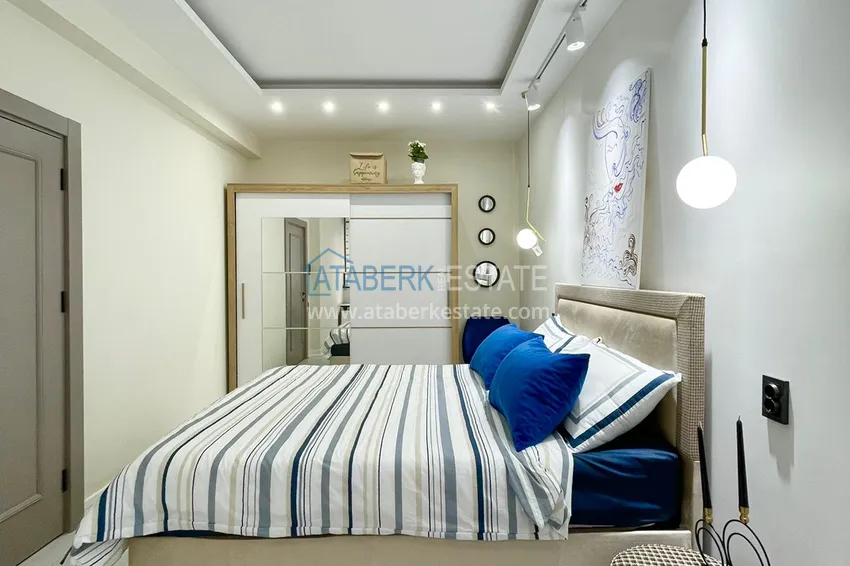 Приобрести Двухкомнатная квартира 80м2 с мебелью и застекленным балконом в Мерсине, Енишехир 10 