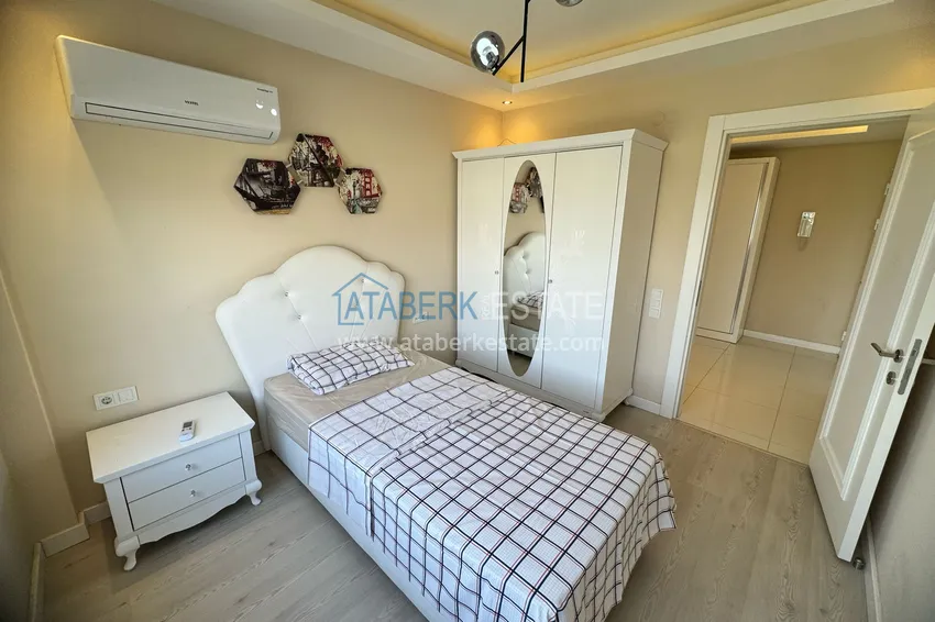 Приобрести Квартира в районе Кестель, Алания с мебелью на первой береговой линии 12