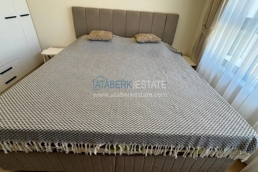 Приобрести Квартира 1+1 с мебелью и видом на горы. Новостройки Алании, район Махмутлар 10 