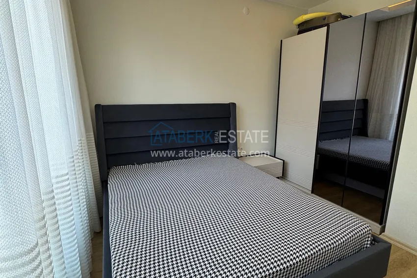 Приобрести Квартира 1+1 с новой мебелью и видом на горы в современном комплексе - район Махмутлар, Алания 11 