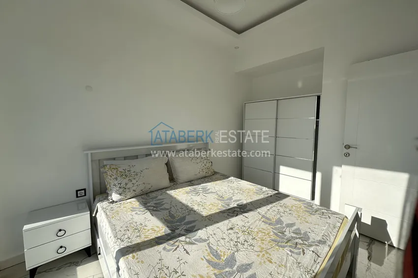 Приобрести Двухкомнатные меблированные квартиры с видом на море, район Кестель, Алания 10