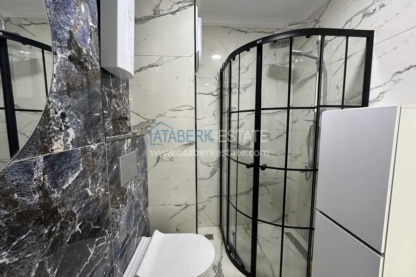 Приобрести Двухкомнатные меблированные квартиры с видом на море, район Кестель, Алания 25