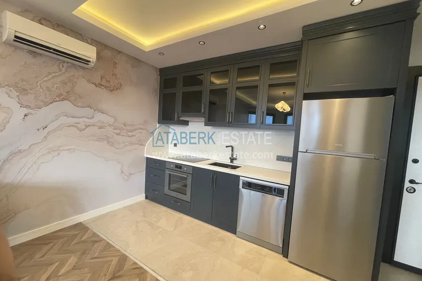 Приобрести Двухкомнатная квартира под ключ с видом на море – район пляжа Кейкубат, центр Алании 11 