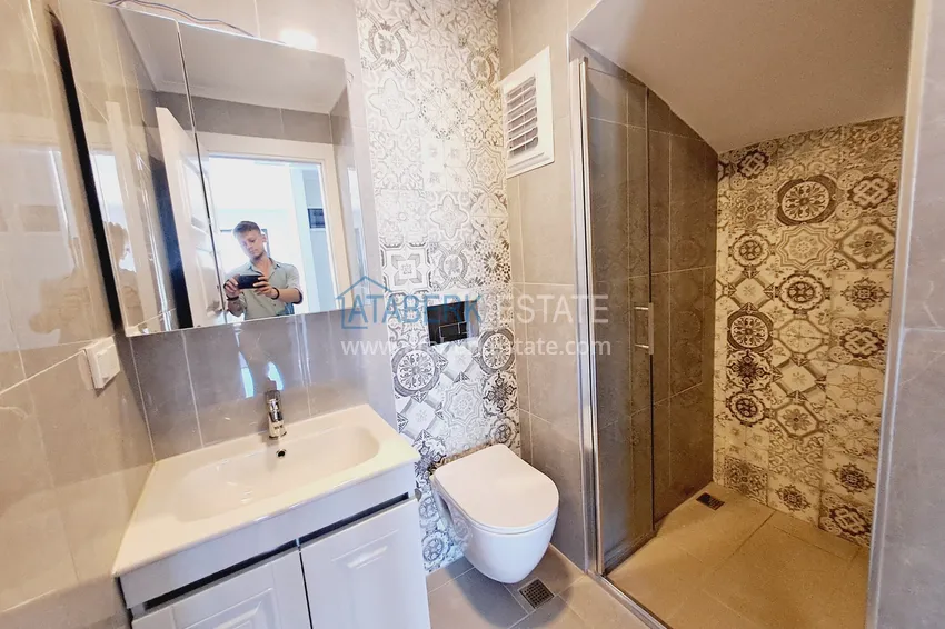 Приобрести Срочная продажа! Роскошный двухуровневый пентхаус с видовыми характеристиками в Алании, район Махмутлар 11