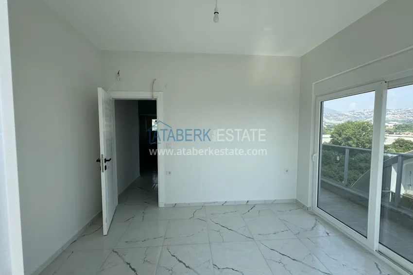 Приобрести Дуплекс 2+1 с видом на море и горы – район Каргыджак, Алания 11 