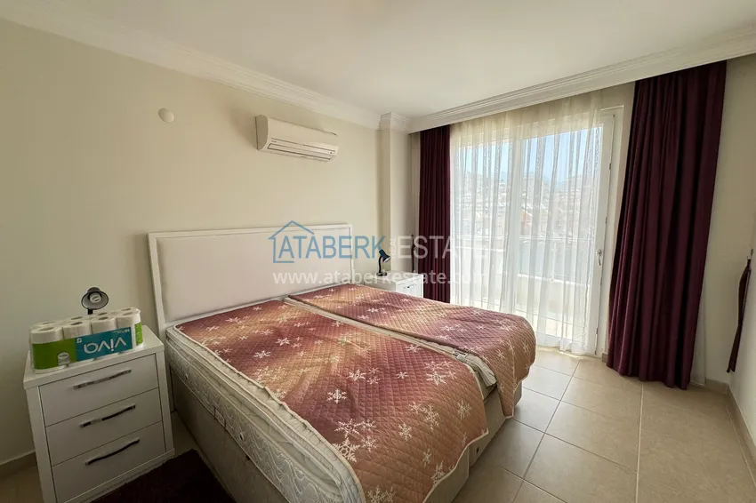 Приобрести Квартира 2+1 меблированная с видом на горы и море в престижном комплексе, район Джикджилли – Алания 11 