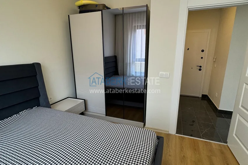 Приобрести Квартира 1+1 с новой мебелью и видом на горы в современном комплексе - район Махмутлар, Алания 12 