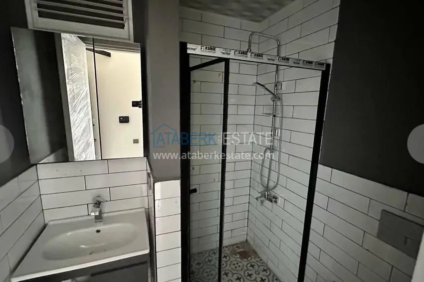 Приобрести Двухкомнатная квартира в микрорайоне Арпачбахшиш, Мерсин 12 