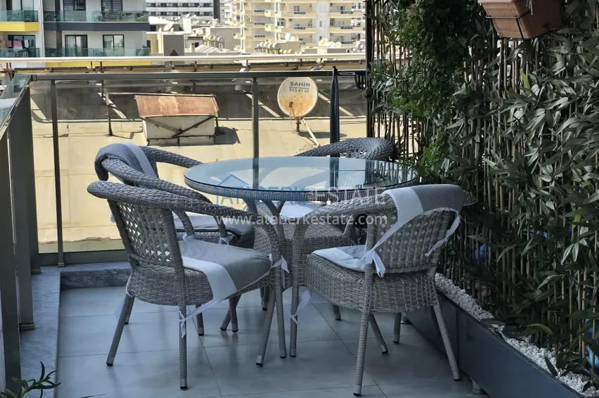 Приобрести Трехкомнатная квартира в комплексе класса люкс, на первой береговой линии – район Махмутлар, Алания 12 