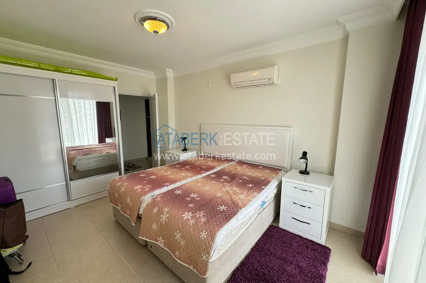 Приобрести Квартира 2+1 меблированная с видом на горы и море в престижном комплексе, район Джикджилли – Алания 12 