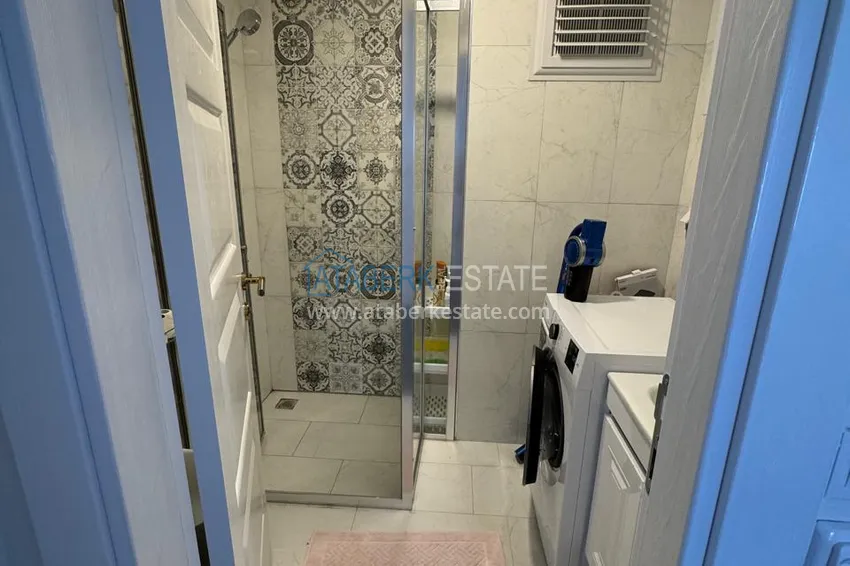 Приобрести Квартира 1+1 с мебелью и видом на горы. Новостройки Алании, район Махмутлар 13 