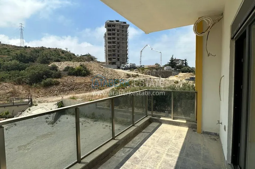 Приобрести Двухкомнатная квартира с чистовой отделкой – район Демирташ, Алания 15 