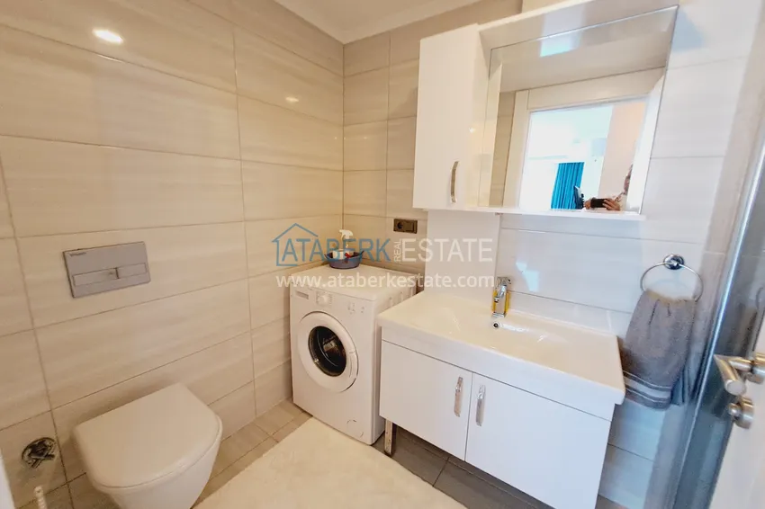 Приобрести Двухкомнатная квартира 82 м2 с мебелью от собственника в Махмутларе, Алания 13 