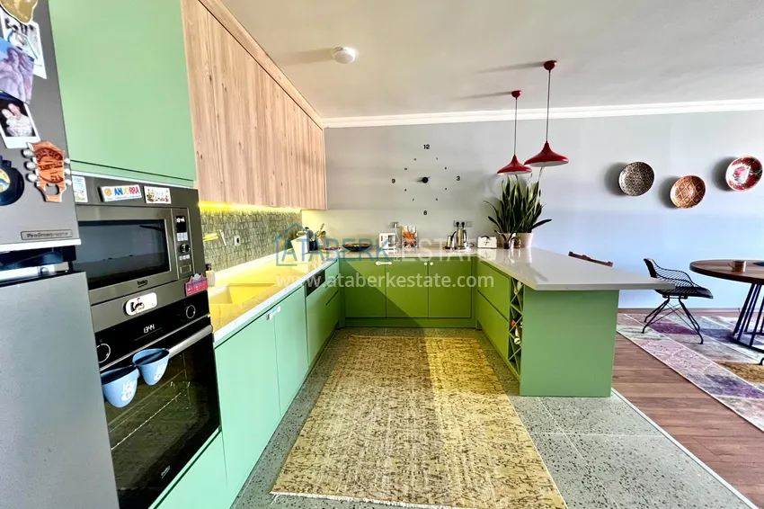 Приобрести Двухуровневый пентхаус с авторским дизайном и исключительными видовыми характеристиками – Тосмур, Алания 12 