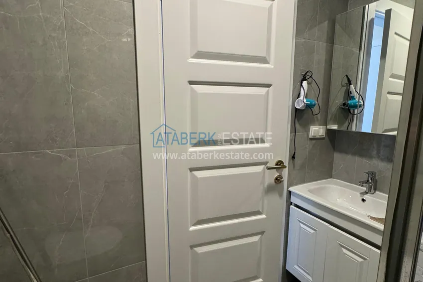 Приобрести Квартира 1+1 с новой мебелью и видом на горы в современном комплексе - район Махмутлар, Алания 15 