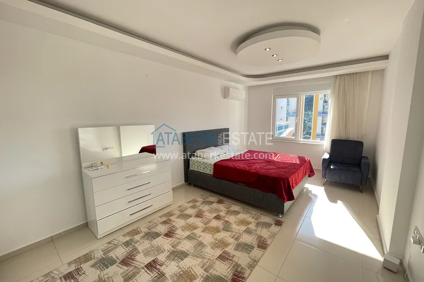 Приобрести Меблированная трехкомнатная квартира в районе Тосмур, Алания 14 