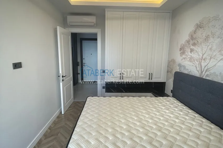 Приобрести Двухкомнатная квартира под ключ с видом на море – район пляжа Кейкубат, центр Алании 15 