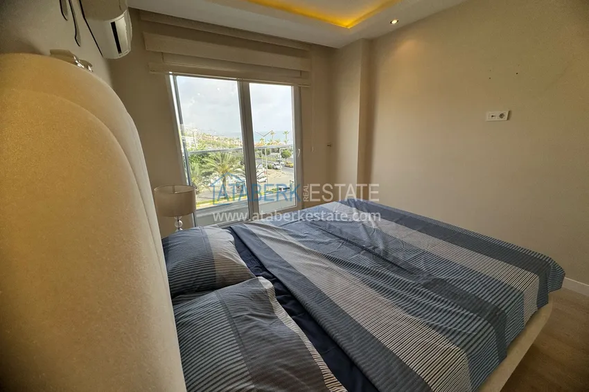 Приобрести Квартира в районе Кестель, Алания с мебелью на первой береговой линии 16