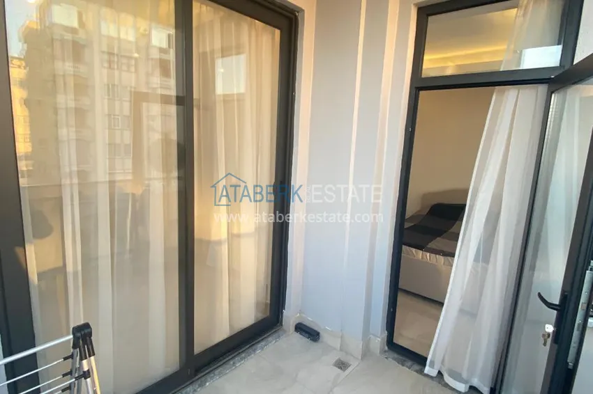 Приобрести Меблированная двухкомнатная квартира от собственника в новостройке - район Оба, Алания 15 