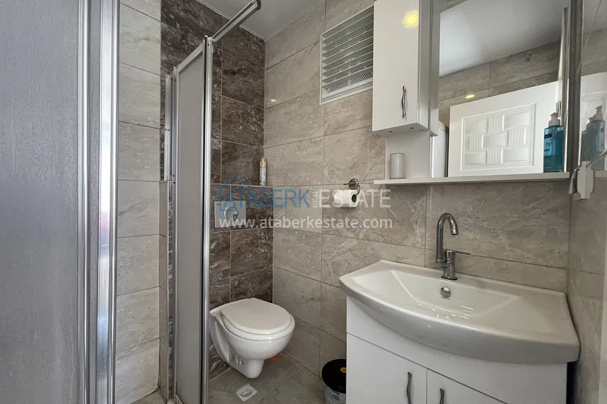 Приобрести Меблированная трехкомнатная квартира в районе Тосмур, Алания 15 