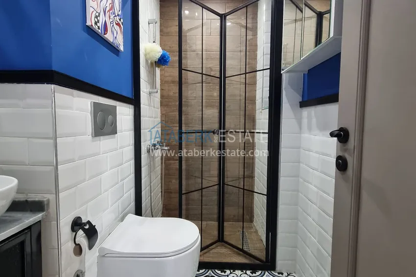 Приобрести Двухкомнатная квартира 80м2 с мебелью и застекленным балконом в Мерсине, Енишехир 15 