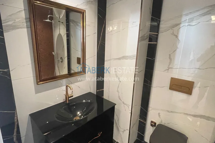 Приобрести Двухкомнатная квартира под ключ с видом на море – район пляжа Кейкубат, центр Алании 16 