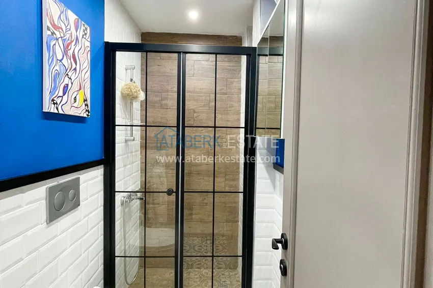 Приобрести Двухкомнатная квартира 80м2 с мебелью и застекленным балконом в Мерсине, Енишехир 16 