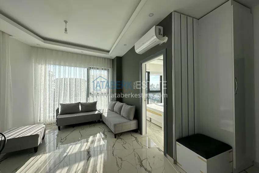 Приобрести Двухкомнатные меблированные квартиры с видом на море, район Кестель, Алания 1