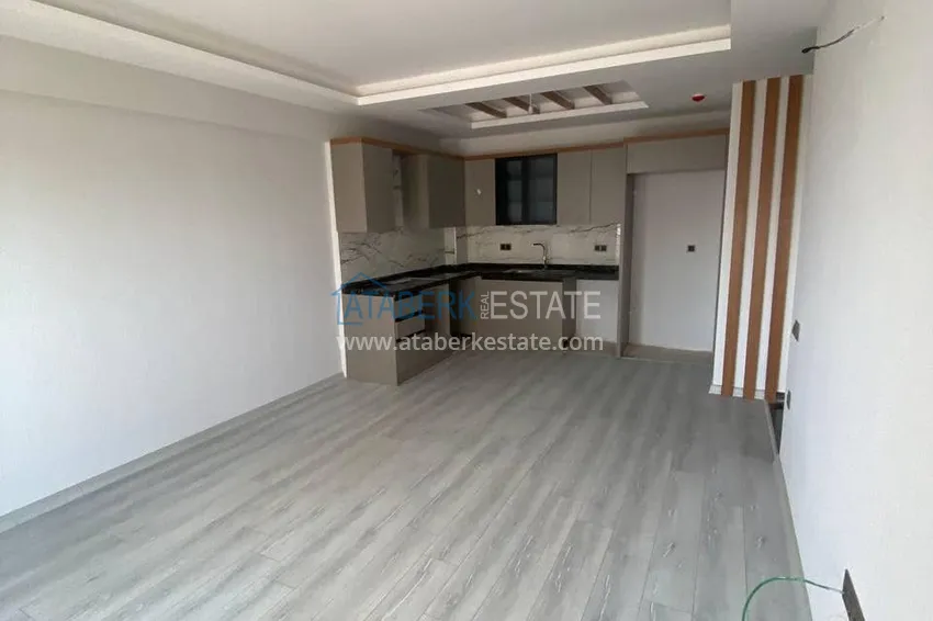 Приобрести Прекрасная двухкомнатная квартира с видом на море в Арпачбахшиш, Мерсин 1 