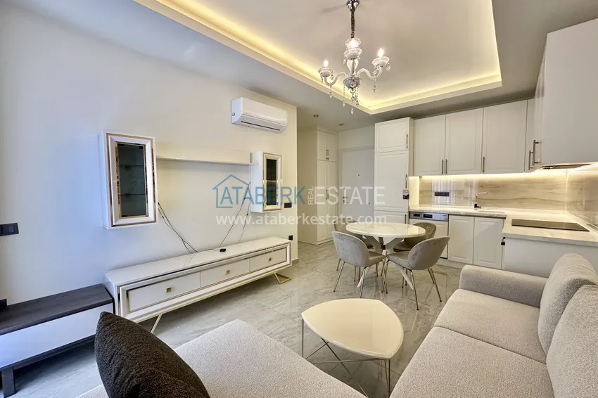 Приобрести Двухкомнатная квартира с мебелью - центр Алании. Подходит для краткосрочной аренды 1 