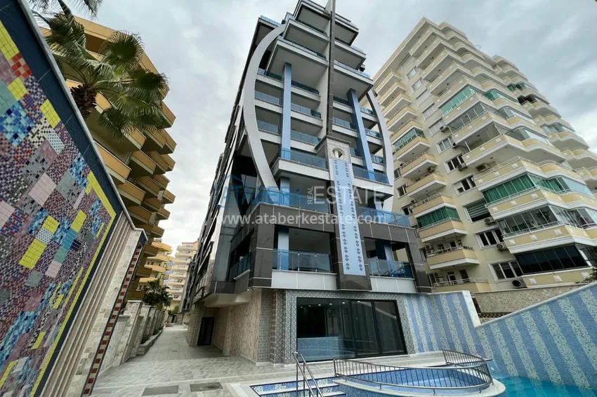 Квартира в Махмутларе с дизайнерским интерьером и прямым видом на море 1 