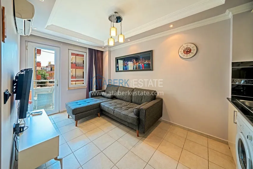 Приобрести Двухкомнатная меблированная квартира в районе пляжа Клеопатра, центр Алании 1 