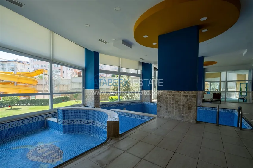 Квартира 2+1 меблированная с видом на горы и море в престижном комплексе, район Джикджилли – Алания 31 