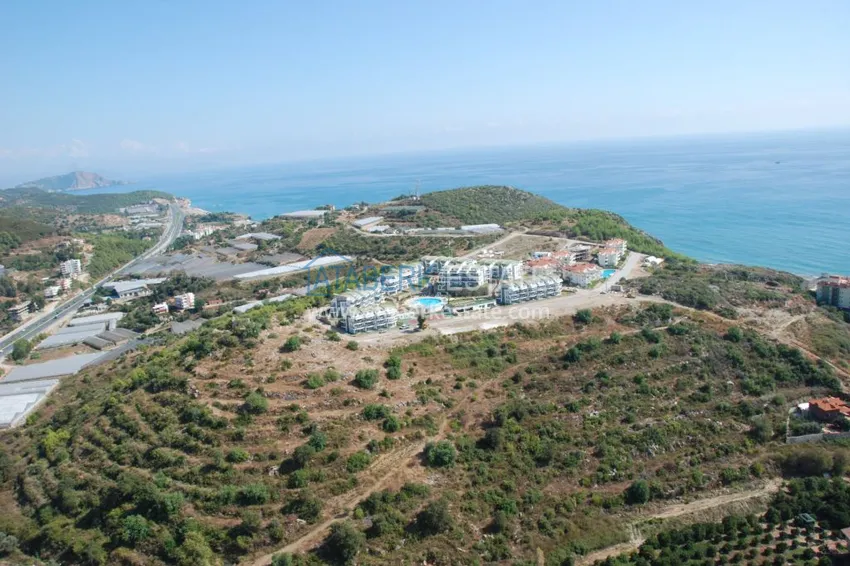 Линейна квартира 3+1 под ключ с выходом в сад и видом на море - район Конаклы, Алания 1 