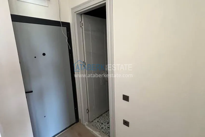 Приобрести Двухкомнатная квартира в микрорайоне Арпачбахшиш, Мерсин 2 