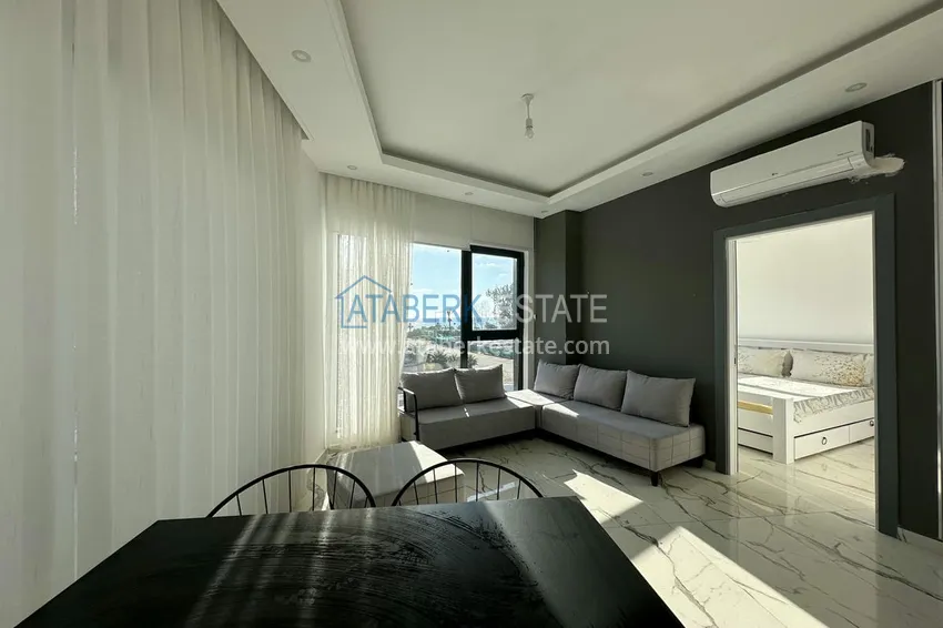 Приобрести Двухкомнатные меблированные квартиры с видом на море, район Кестель, Алания 2